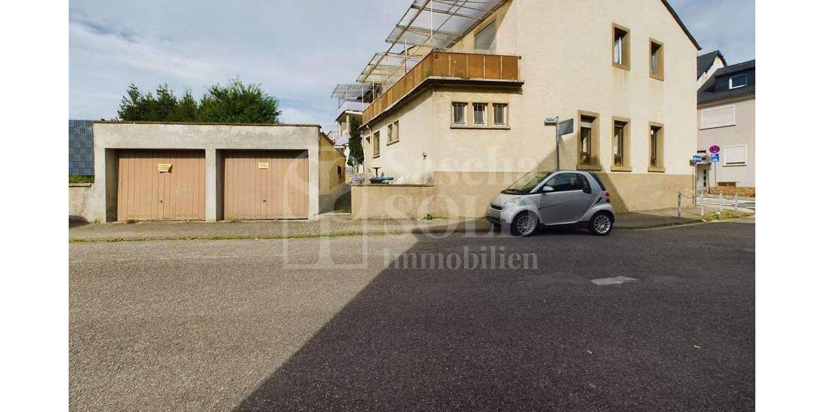 Wohn- und Geschäftshaus in St. Ingbert - für Investoren - mit Wohnung, Gewerbe, Garten und Garagen - Reihenendhaus Sankt Ingbert St. Ingbert | Angebot:23973449