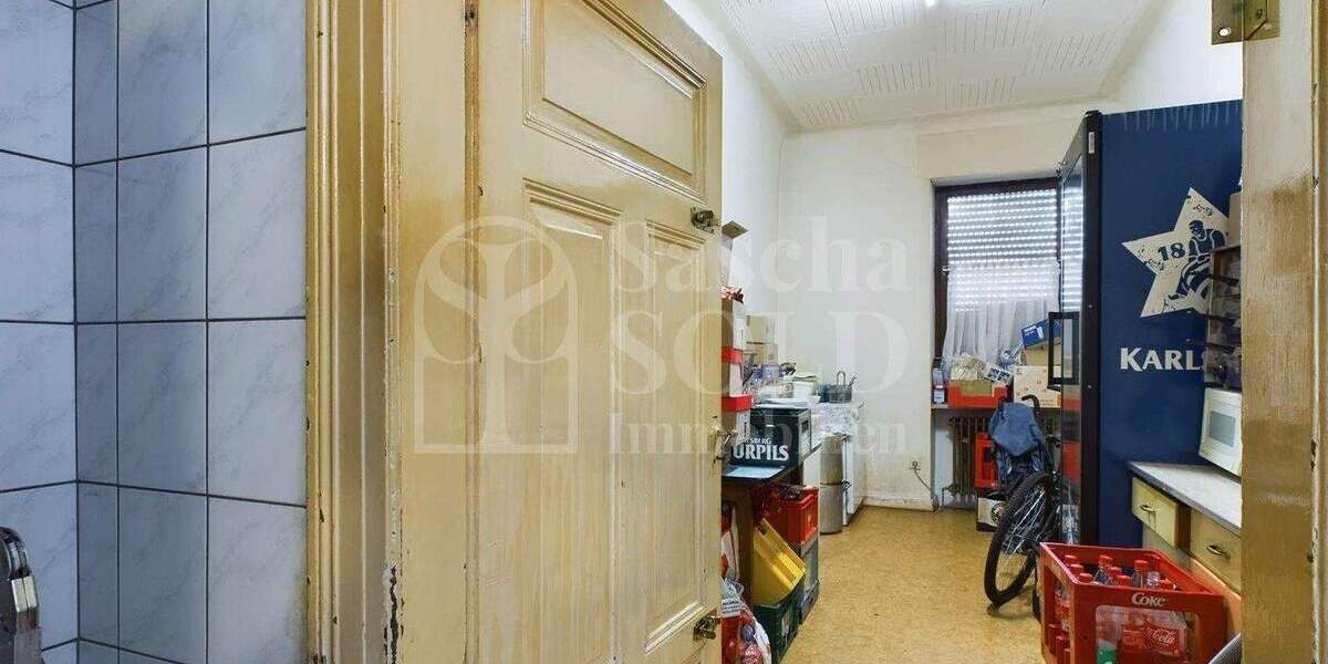 Wohn- und Geschäftshaus in St. Ingbert - für Investoren - mit Wohnung, Gewerbe, Garten und Garagen - Reihenendhaus Sankt Ingbert St. Ingbert | Angebot:23973449