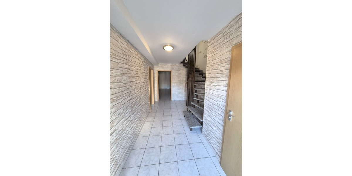 Kapitalanlagepaket: 3 vermietete Reihenhäuser in Reihe mit Garagen und Grundstück - Wohn- & Geschäftshaus Queidersbach | Angebot:21107898