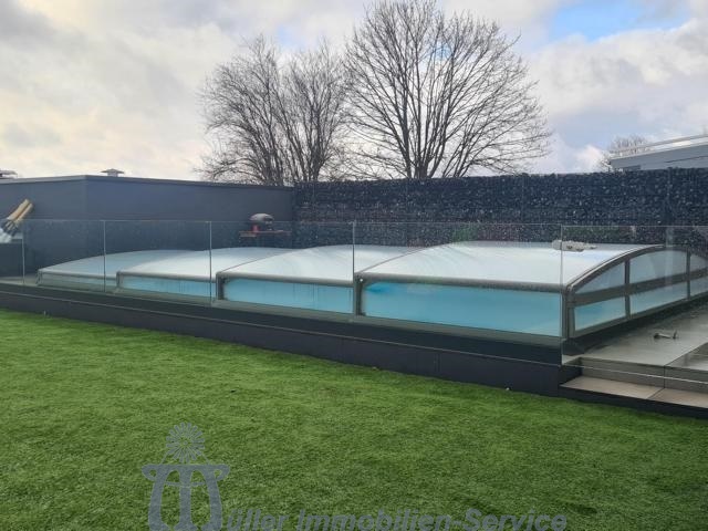 Modernes luxuriöses Wohnhaus, Bungalowstil, mit Außenpool, in schöner Stadtrandlage - Einfamilienhaus Homburg | Angebot:14540143