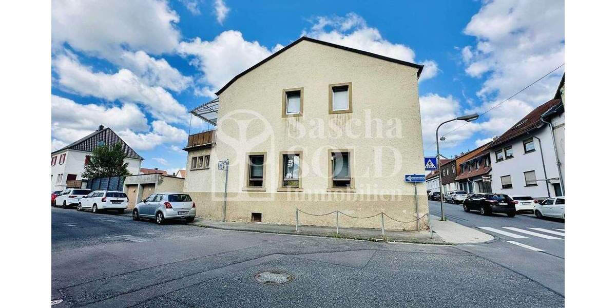 Wohn- und Geschäftshaus in St. Ingbert - für Investoren - mit Wohnung, Gewerbe, Garten und Garagen - Reihenendhaus Sankt Ingbert St. Ingbert | Angebot:23973449