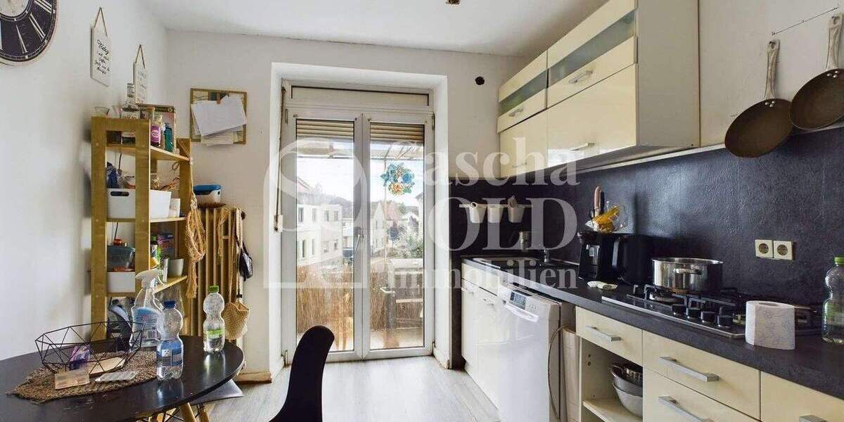 Wohn- und Geschäftshaus in St. Ingbert - für Investoren - mit Wohnung, Gewerbe, Garten und Garagen - Reihenendhaus Sankt Ingbert St. Ingbert | Angebot:23973449