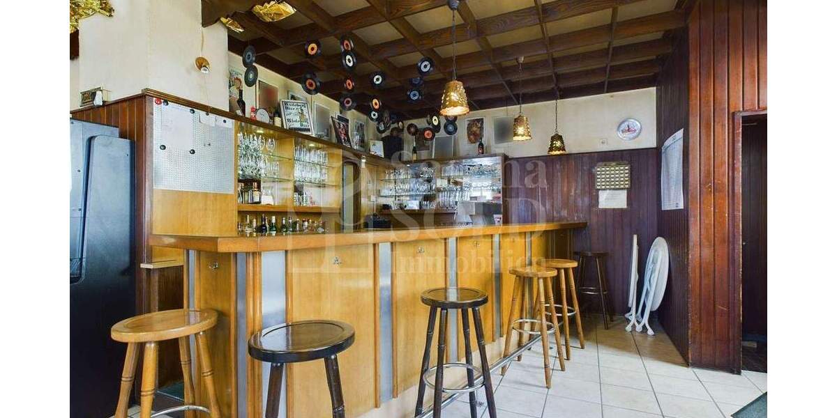 Wohn- und Geschäftshaus in St. Ingbert - für Investoren - mit Wohnung, Gewerbe, Garten und Garagen - Reihenendhaus Sankt Ingbert St. Ingbert | Angebot:23973449