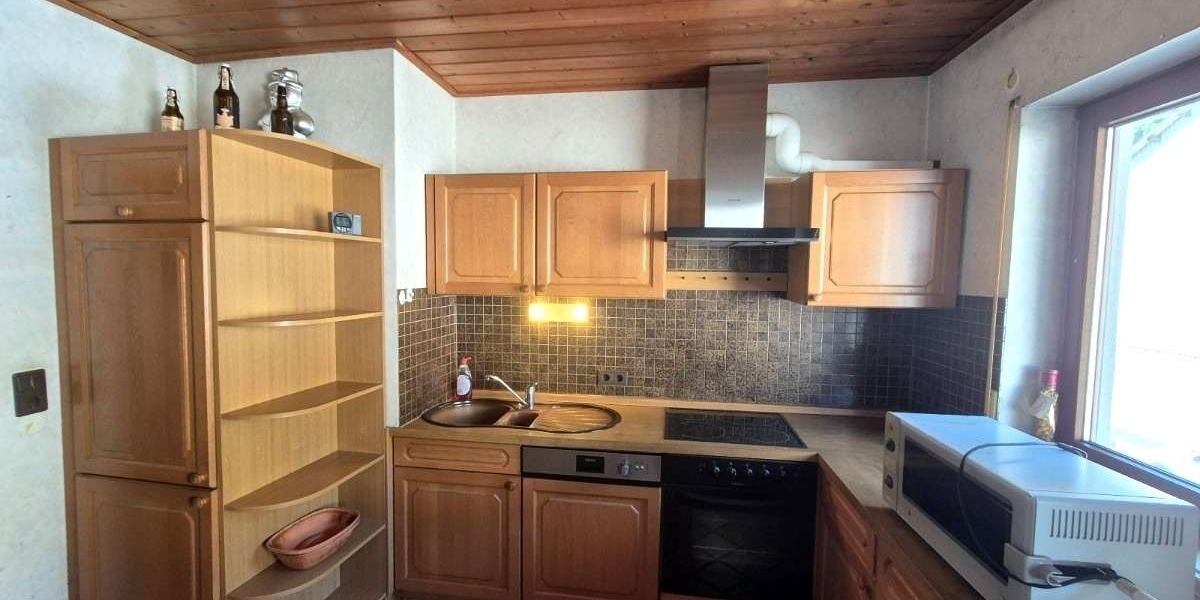 Vielseitiges Zweifamilienhaus mit Gewerbemöglichkeit, zahlreichen Stellplätzen u. idyllischem Garten - Mehrfamilienhaus, Wohnhaus Friedelhausen Friedelhausen | Angebot:27131029