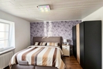 Vielseitiges Mehrfamilienhaus ideal für Kapitalanleger oder Selbstnutzer, Zweibrücken Niederauerbach - Mehrfamilienhaus, Wohnhaus Zweibrücken | Angebot:27159281